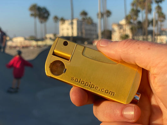 LIP solo  all-in-one lighter pipe combo is a butane refillable lighter with a sliding lid cover